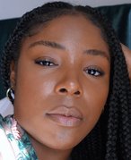 close up image of someone's face with little minimal makeup on