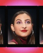 person wearing pink eyeshadow and red lipstick