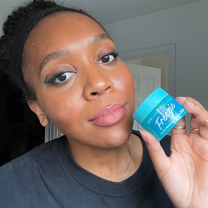 Kat holding the NYX Professional Makeup Face Freezie Cooling Primer + Moisturizer