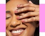 A woman wearing nail polish