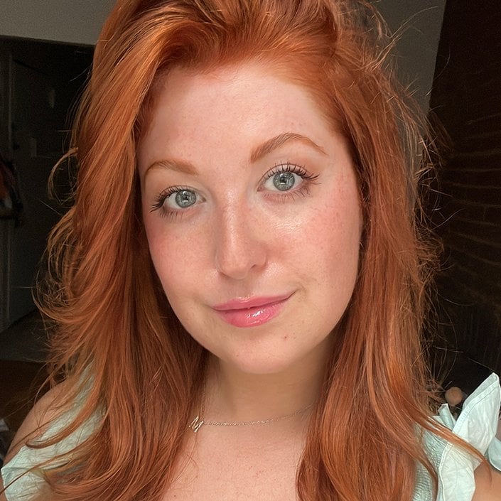 A woman with long red hair